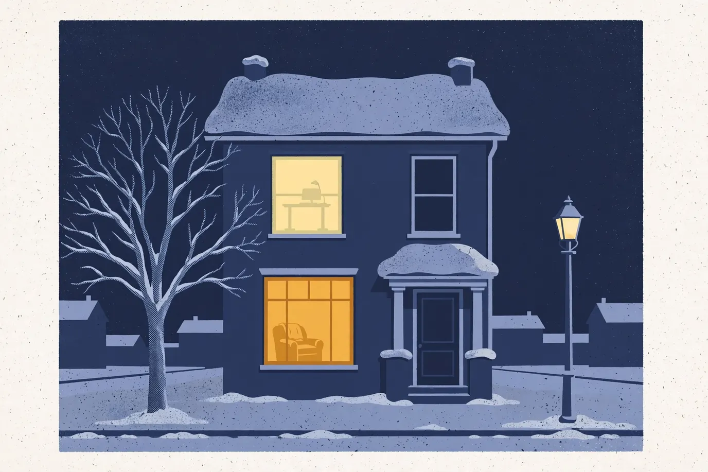 A two-story stucco duplex at night in the snow, one window glowing warm downstairs and one upstairs, the rest dark.
